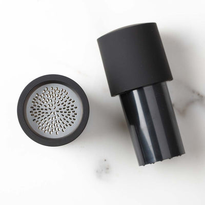 Microplane Spice Mill comes in two parts, push and twist to grind hard spices with ease
