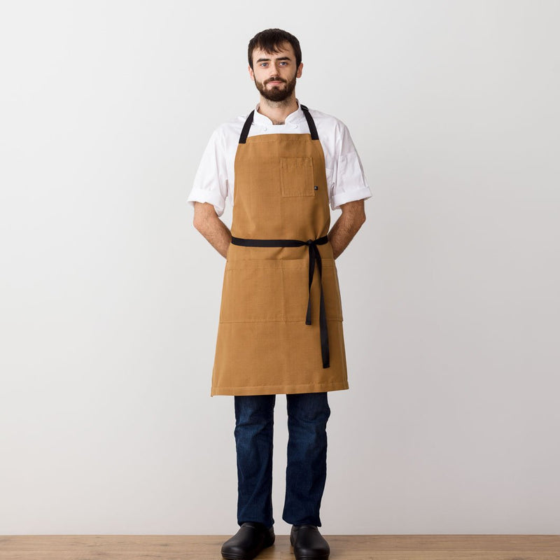 Chef's Apron, Ochre with Black Straps, Carhartt color, Men or Women, model front view-Reluctant Trading