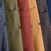 Reluctant Trading aprons in a variety of colors