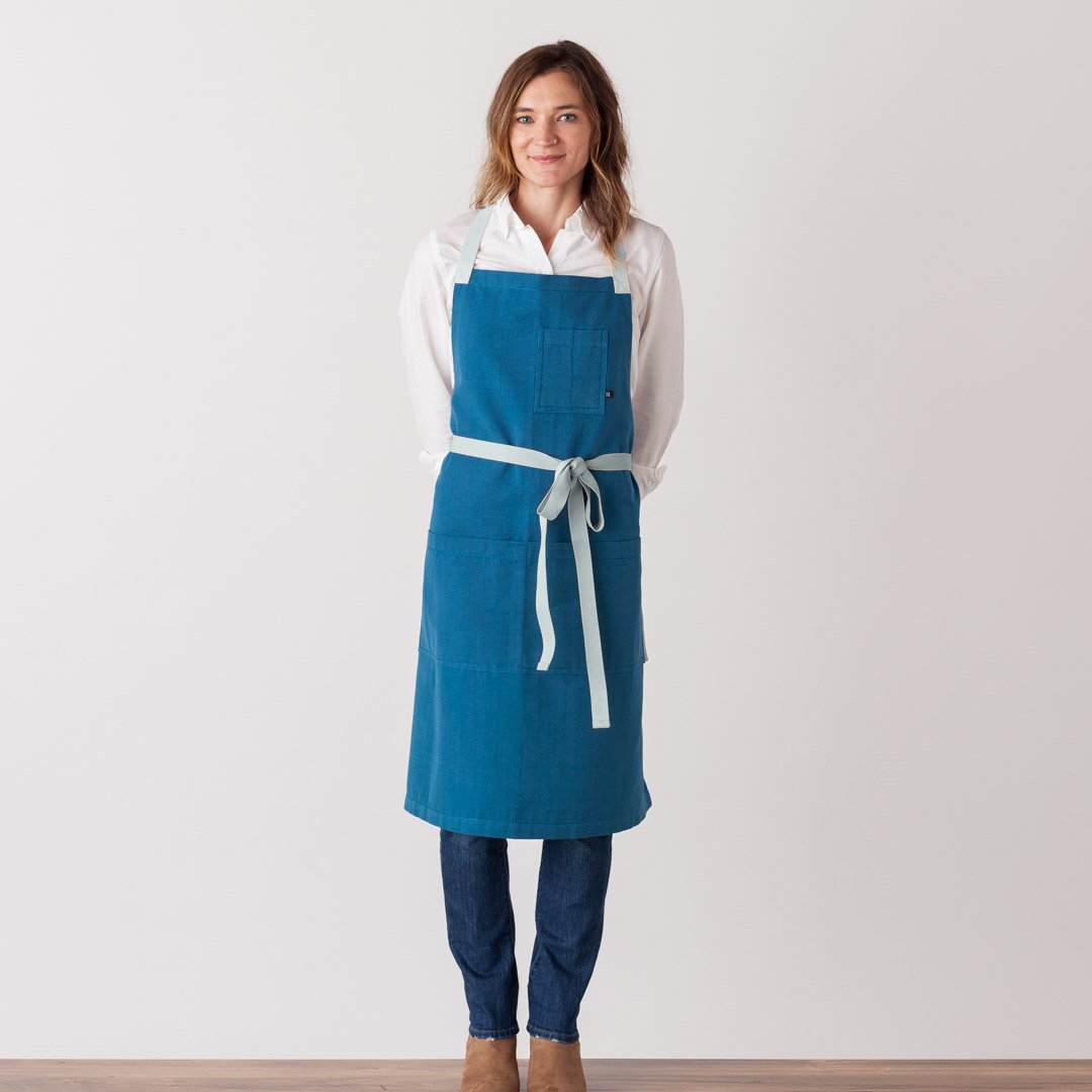 https://reluctanttrading.com/cdn/shop/products/Cross-Back-Chef-Apron-Sky-Blue-with-Ice-Straps-Men-or-Women.jpg?v=1632840785