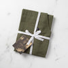 Olive Green Apron Packaged for Gift Giving in Reluctant Trading Cloth Tape