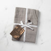 Tan Beige Apron Packaged for Gift Giving in Reluctant Trading Cloth Tape