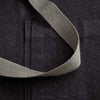 Chef's Apron, Charcoal Black with Tan Straps, detail shot-The Reluctant Trading Experiment