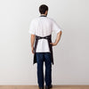 Chef's Apron, Charcoal with Black Straps, Men or Women--Reluctant Trading, model rear view