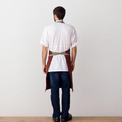 Chef's Apron, Maroon with Tan Straps, Men or Women, model rear view-The Reluctant Trading Experiment