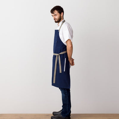Chef's Apron, Navy with Tan Straps, Men or Women, side view model-The Reluctant Trading Experiment