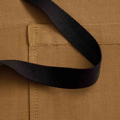 Chef's Apron, Carhartt color with black straps, detail shot, Ochre-Reluctant Trading